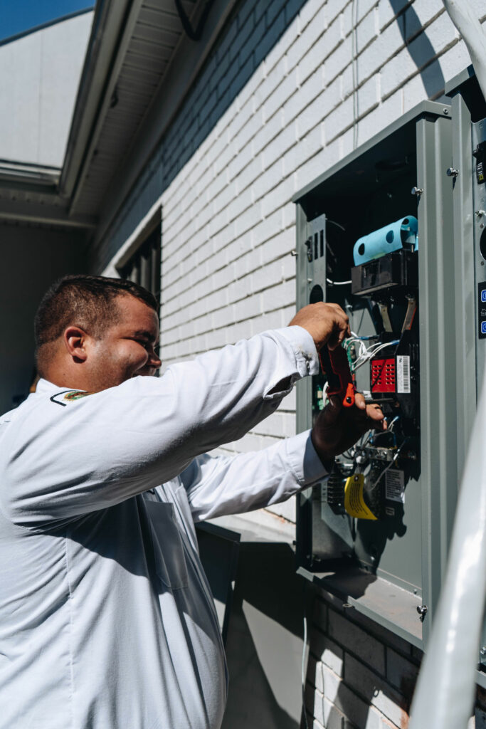 electrician installing a new circuit panel