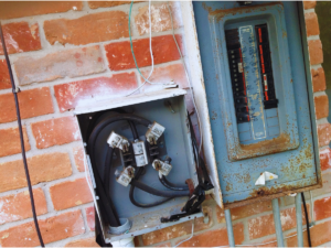 Old electrical panel with corrosion
