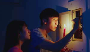 Couple checking breaker box because power keeps going on and off
